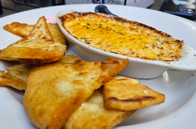 Seawitch Cafe & Tiki Bar signature dishes Carolina Crab Dip
Shrimp Alfredo
Boneless Wings